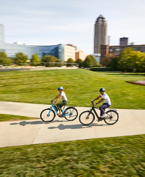 a couple riding e-Bikes