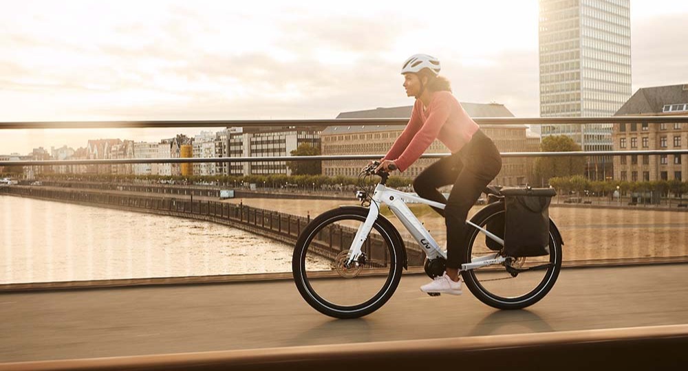 A woman commuting on an eBike.