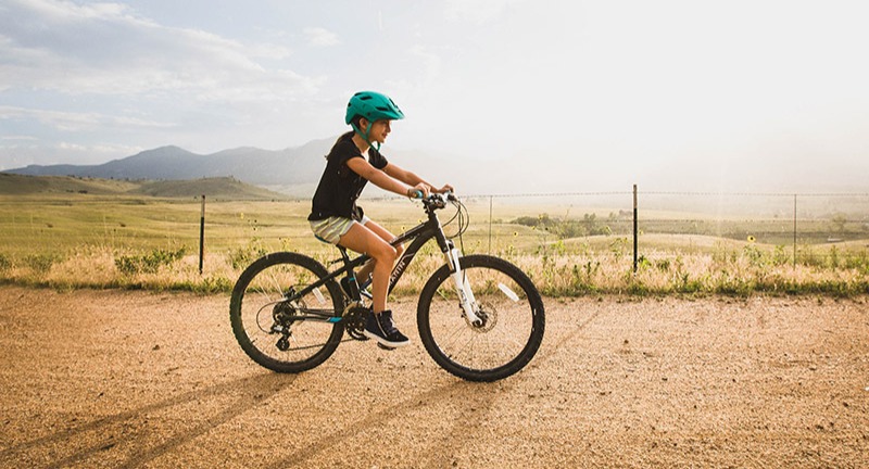 Girl riding a 24" wheel mountain bike