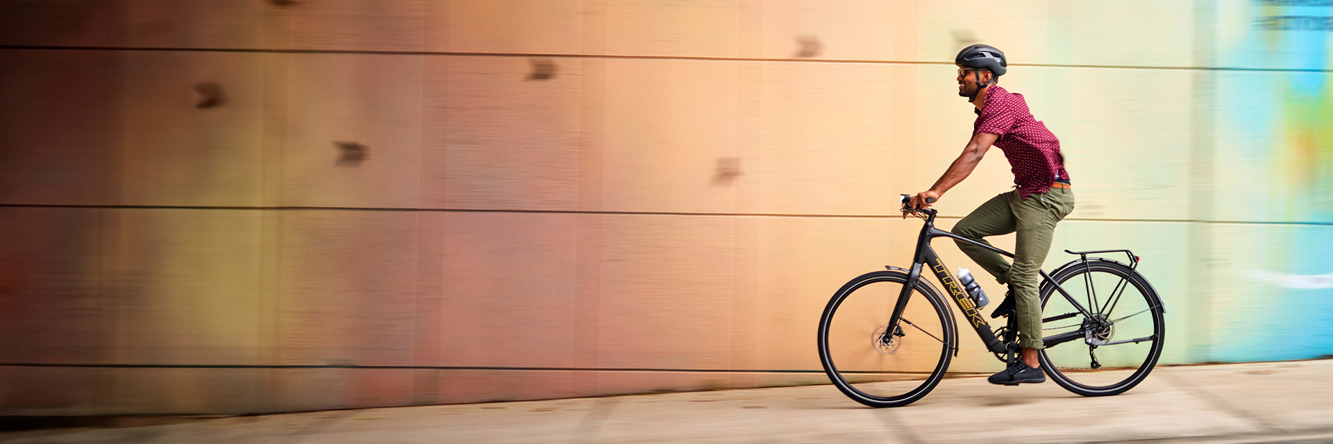 Cyclist on Trek electric hybrid bike