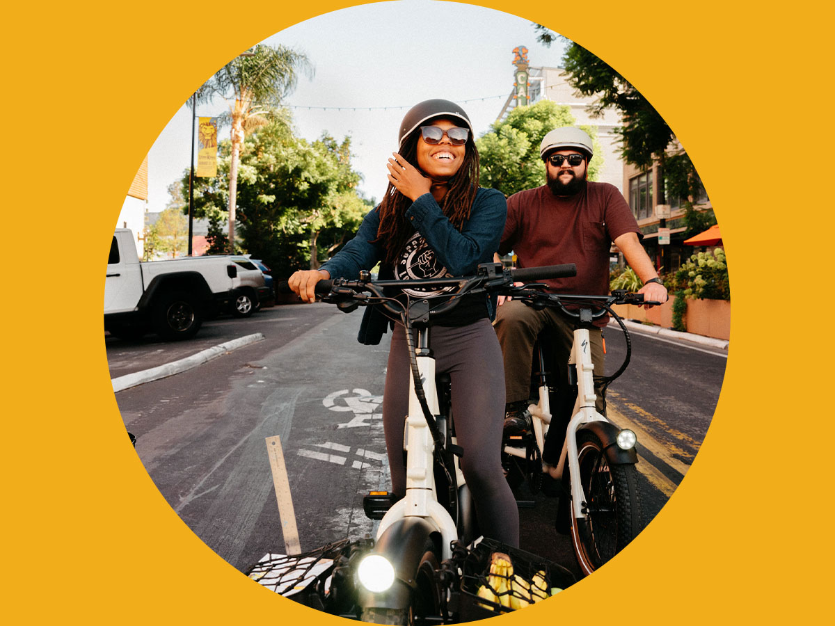 two people riding globe bikes