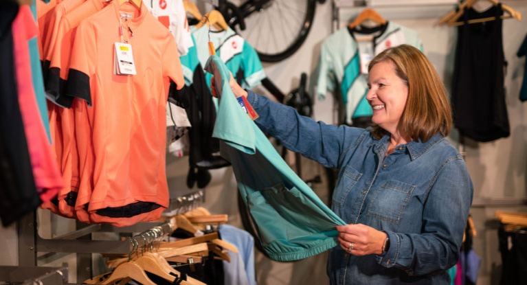 Woman shopping for cycling jersey