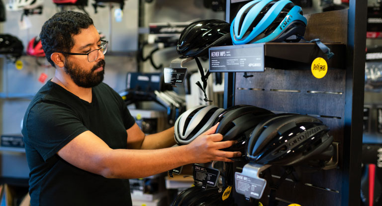 Man shopping for helmet