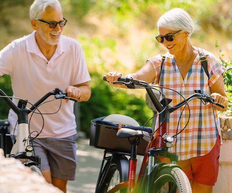 older couple riding bikes