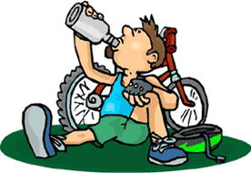 Man leaning on bicycle drinking water