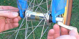 Unscrew the quick release to clear the fork wheel-retention tabs.