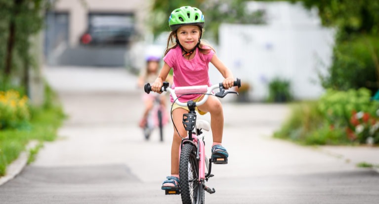 Girl on 16-inch kids' bike