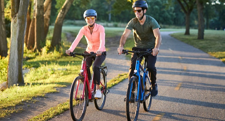 Couple riding electric bikes