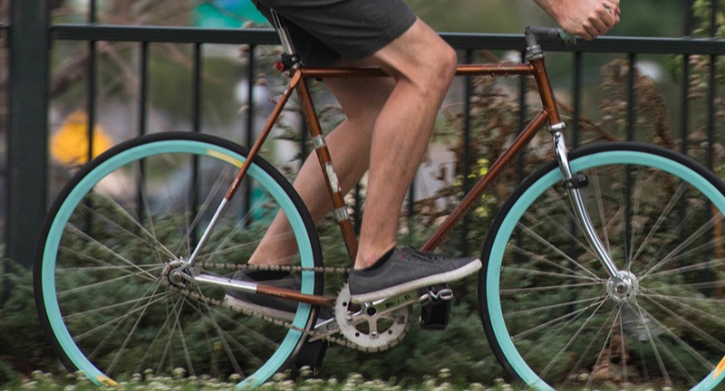 Person riding a single speed bicycle