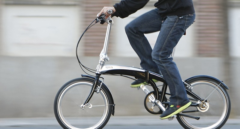 Person commuting on a folding bike