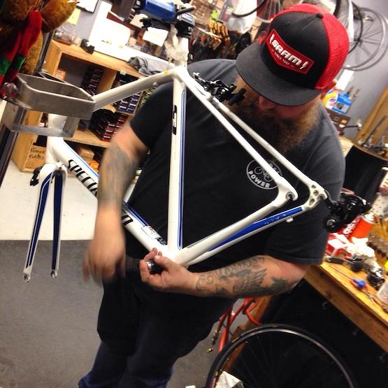 Bike Technician working on a bike