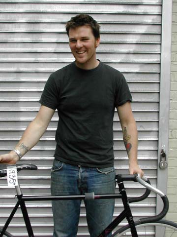 A customer poses with his new bike.