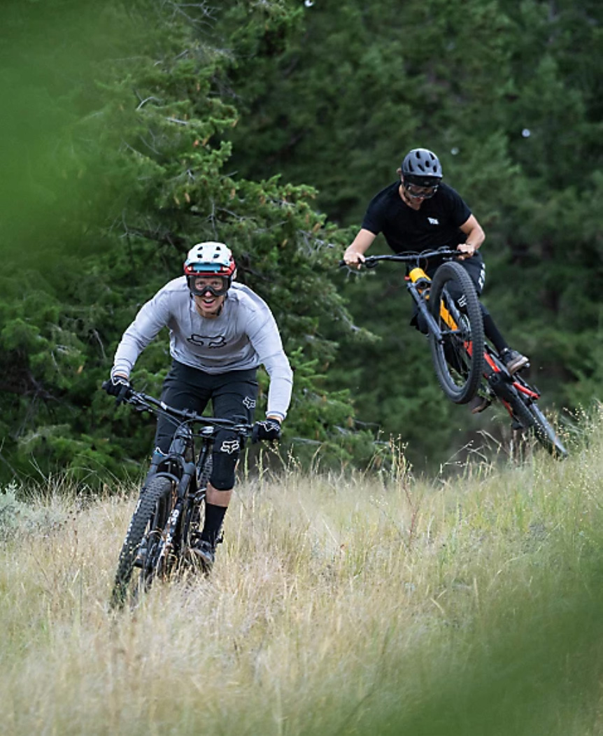 two riders riding electric mountain bikes