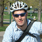 "rider wearing bicycle helmet"