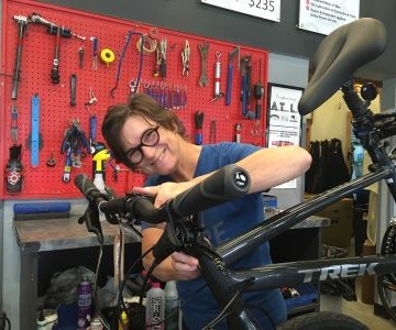 mechanic working on mountain bike