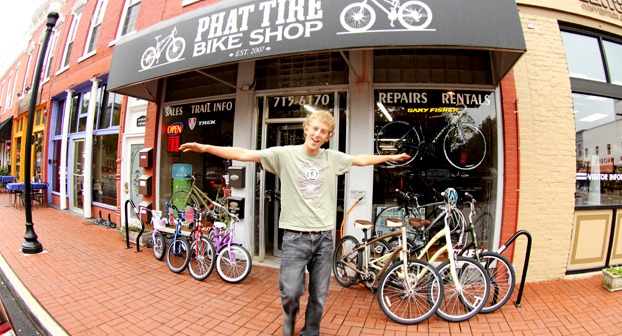 Chris Brosh outside of the first Phat Tire Bike Shop.