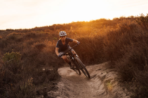 Cross country or XC mountain bikes are ready for singletrack fun. They excel in pedaling fast on moderately challenging terrain. 