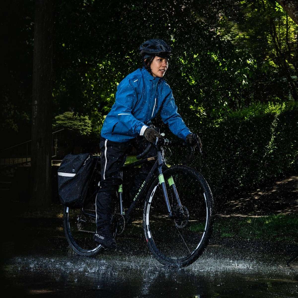 woman wearing rain cycling gear