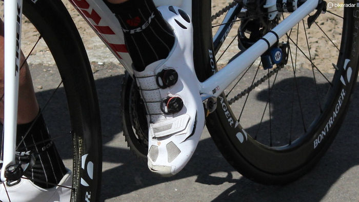 Road bicycle shoes are stiff and light with little if any tread!
