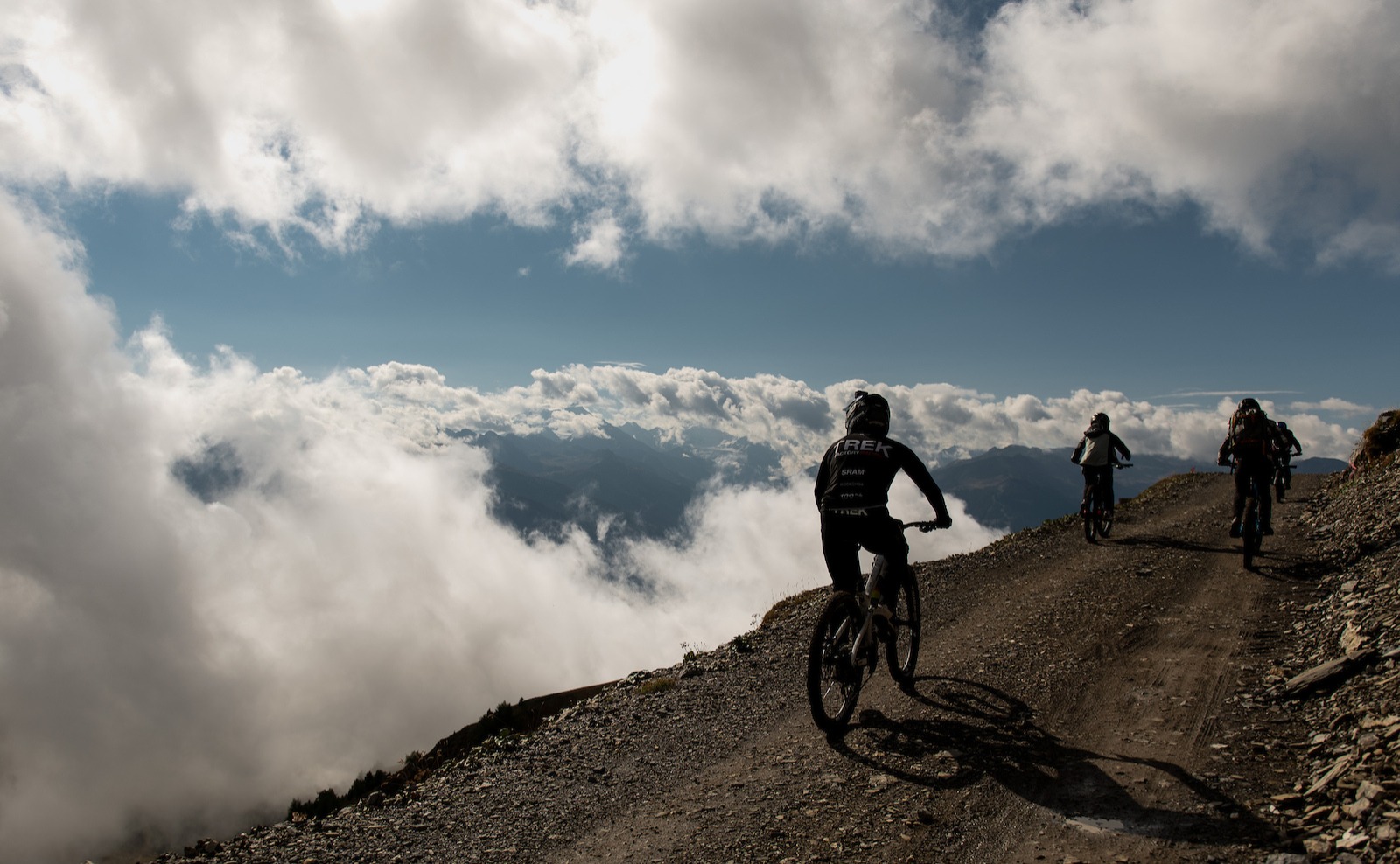 Mountain bikers trail riding