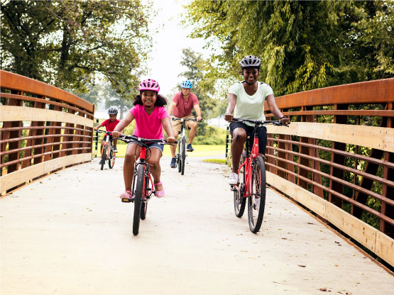 family riding bikes