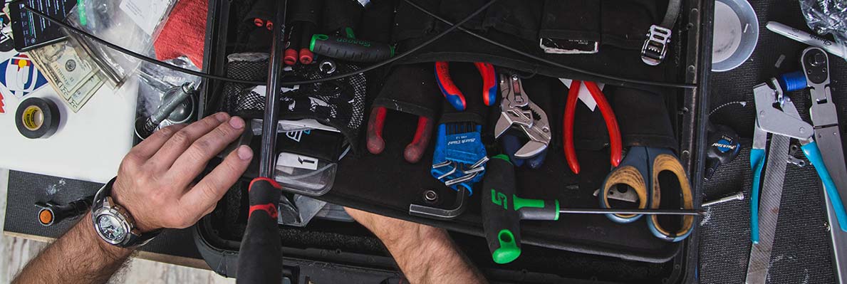 Workbench full of bike repair tools