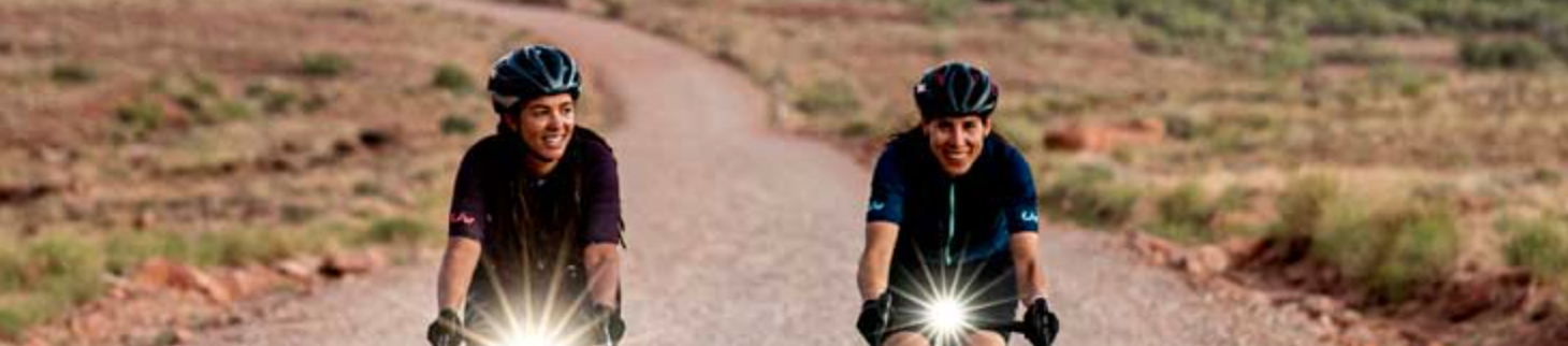 Bikers riding dirt road