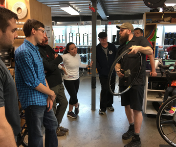 Employee teaching a repair class