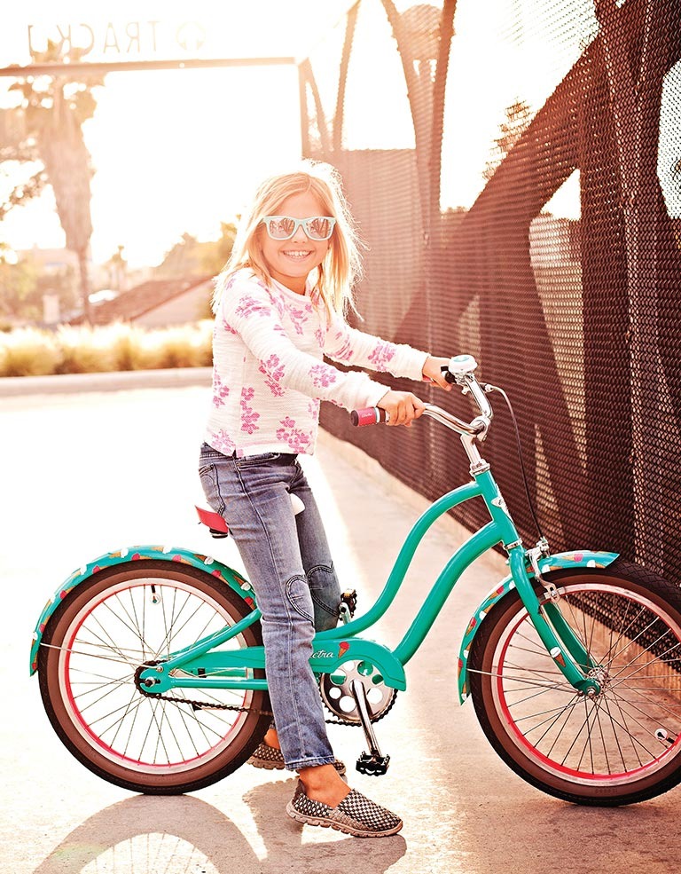 child on electra bike