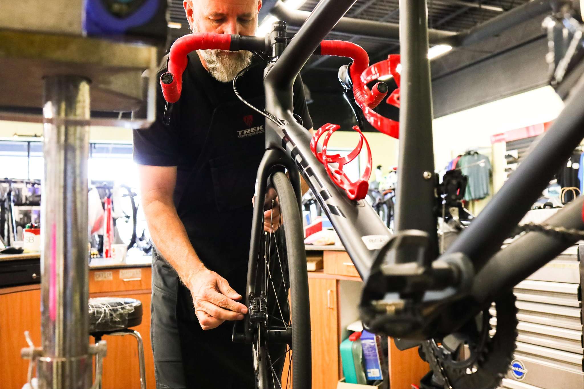 Our mechanic, Matt, working on a bike in the shop.