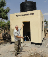 5,000 liter "holding tank" (in Turkana, Kenya) that contains safe, clean water and serves a village including a large indigenous and displaced population. In one week's time, this tank will be emptied and filled 3x!