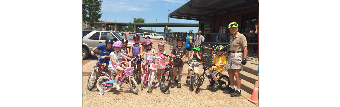 Leroy Bickel leading a bicycle ride in Downtown Burlington, IA