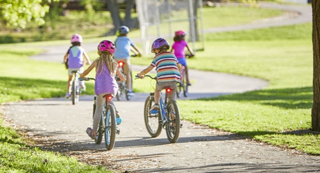 group of kids riding bikes