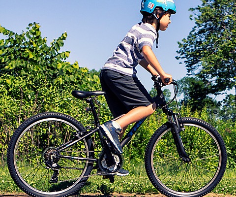 boy riding a bike