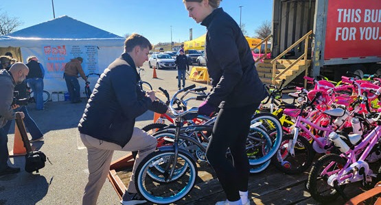 teddy bear in veteran attire delivering presents