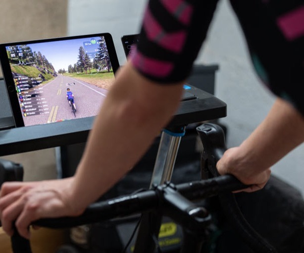 person riding on trainer