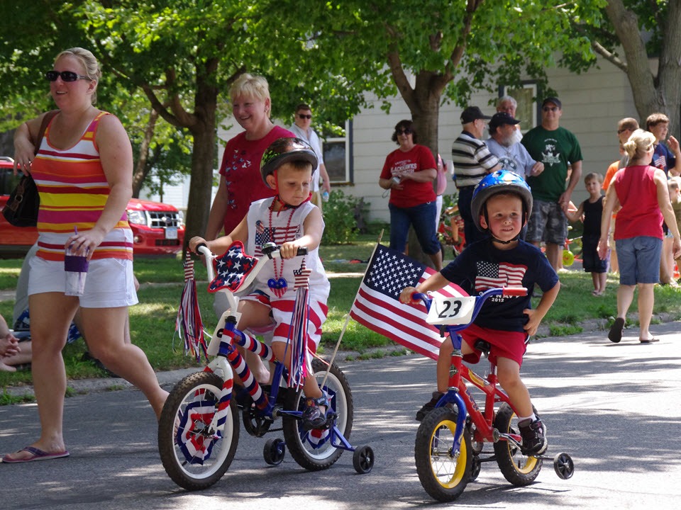 kids riding bikes in a parade