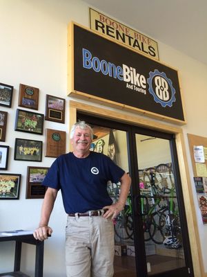 Larry Norris, lifetime customer, stands outside the new shop's inside entry.