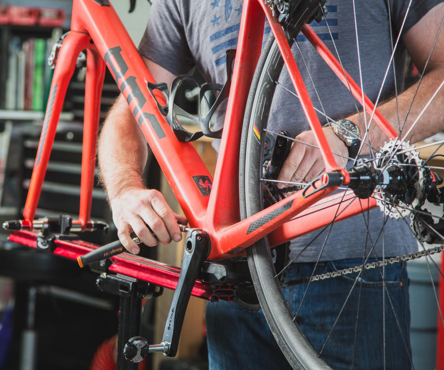 Person servicing a road bicycle