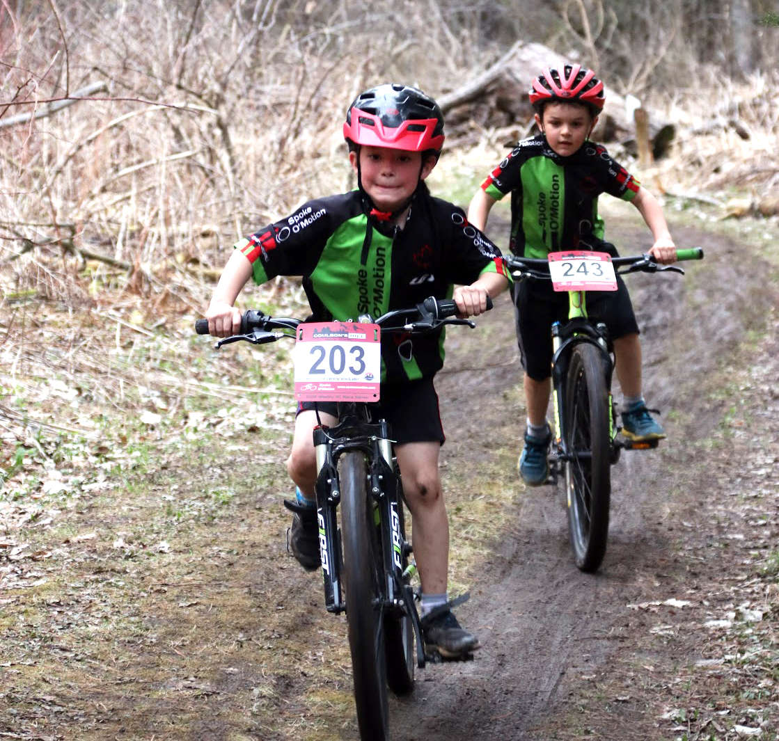 Kaiden (foreground) lead Ryder (background) for two laps.