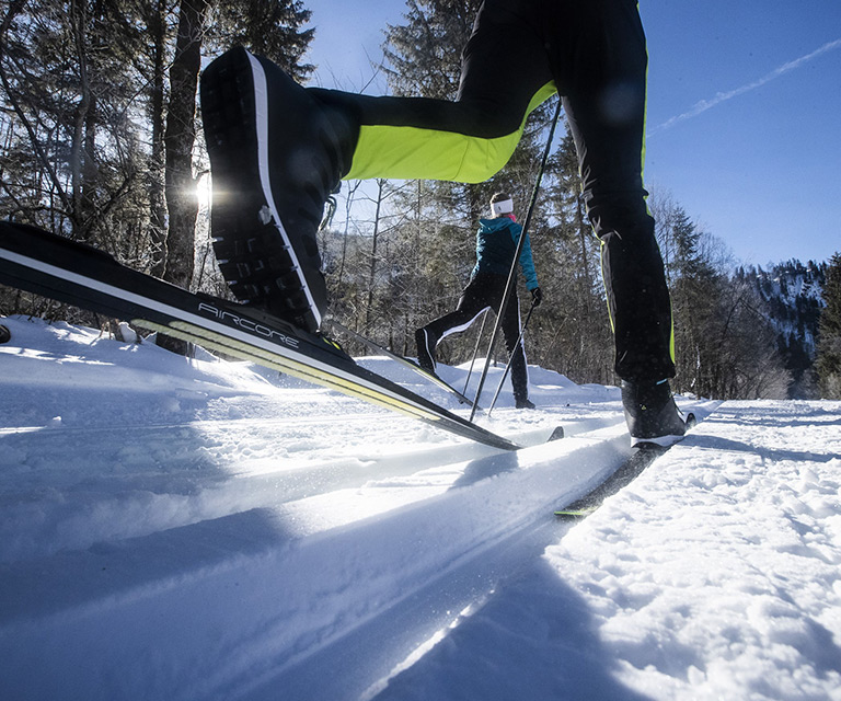 cross country skier on Fischer skis