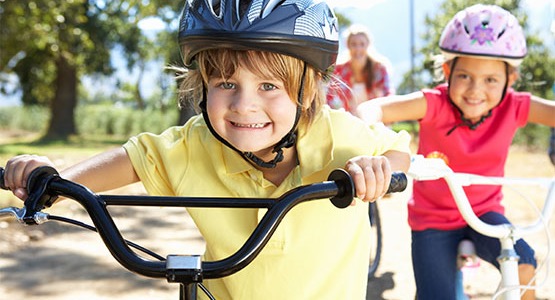 Two Kids Test Riding Their New Bikes