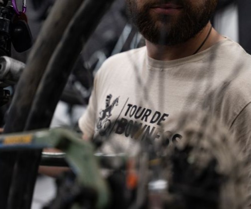 Mechanic tuning a bicycle