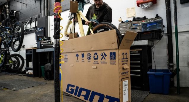Mechanic assembling a bike