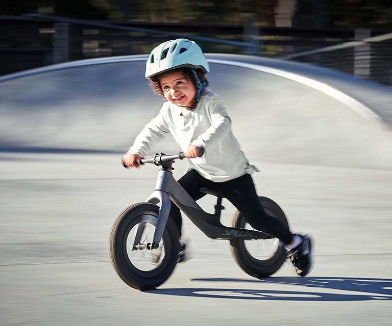 Child on a balance bike