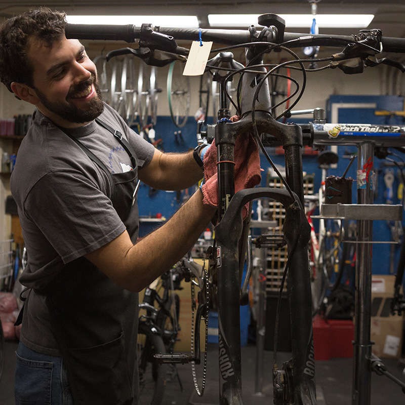 Bike Technician working on a bike