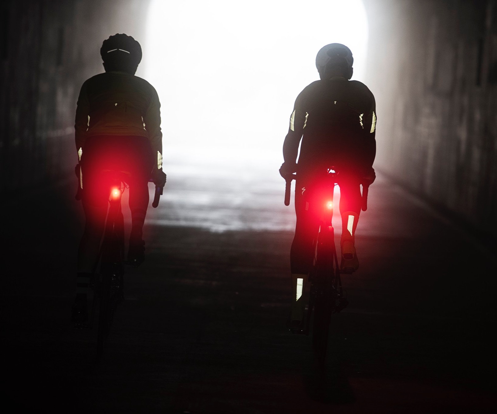 Bikes with lights in the dark.