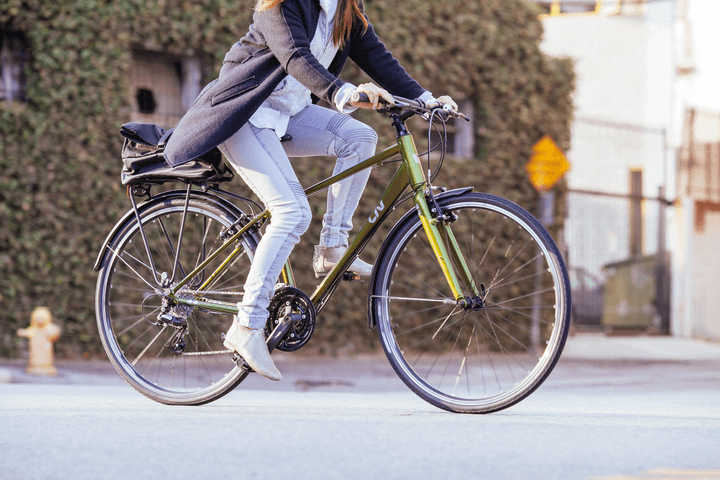 Woman riding a commuter bike,