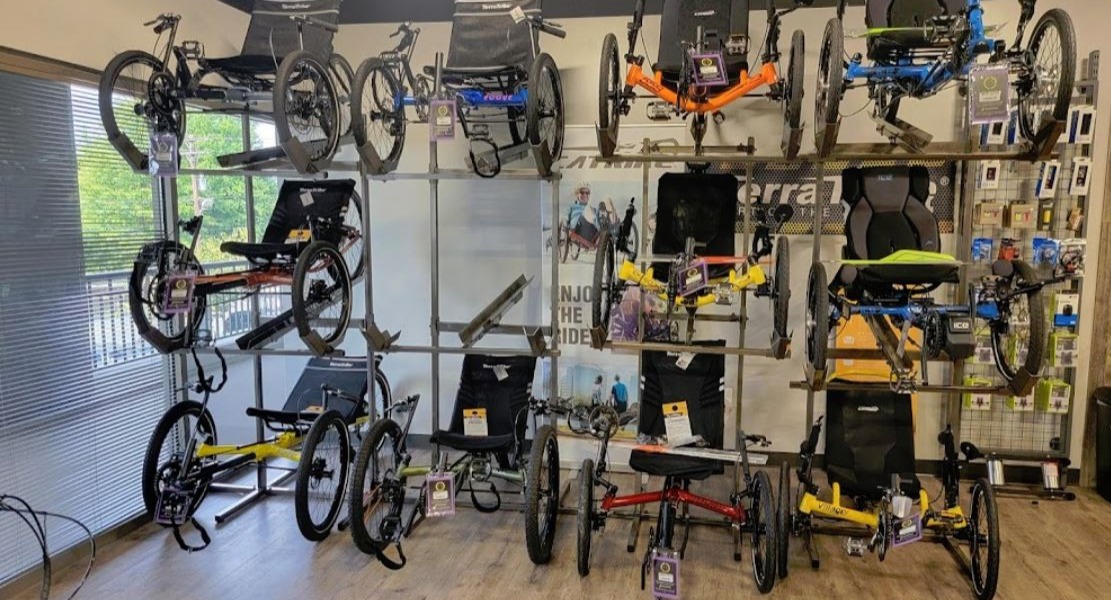 Selection of recumbent tricycles inside the store.