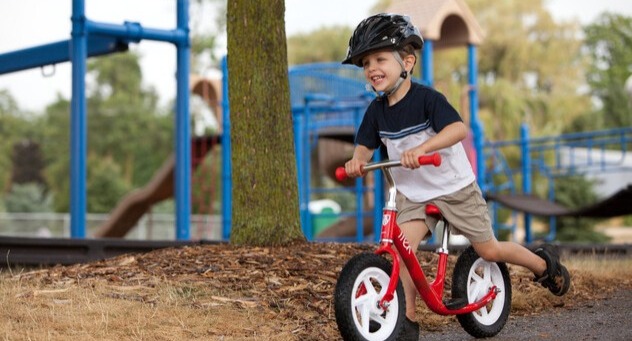 toddler on a push bike